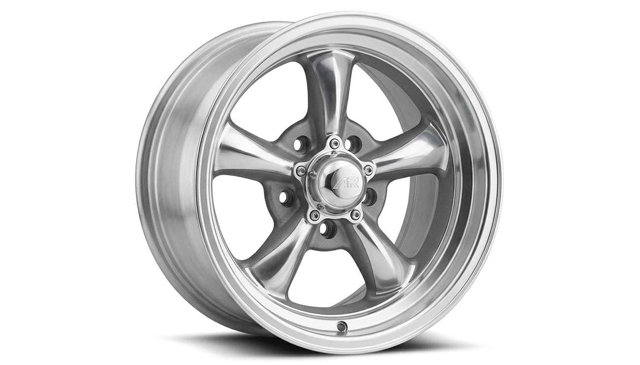 Classic 14 inch five spoke aluminum wheel photographed against a plain white background