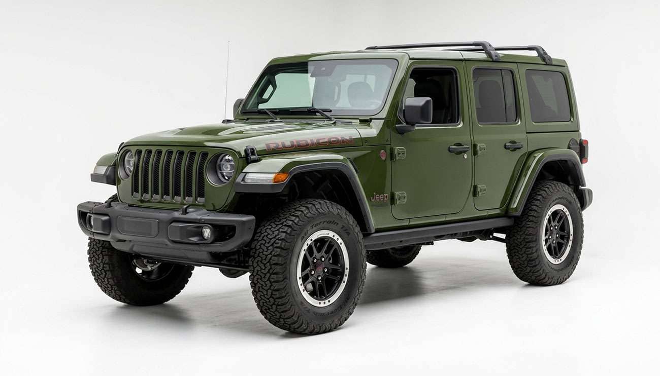 Jeep Wrangler JL Rubicon fitted with 35 inch off-road tires on stock suspension, three-quarter front view