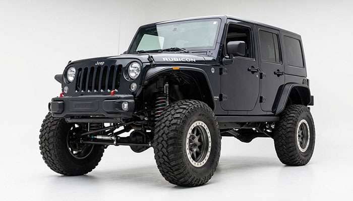 Jeep Wrangler with installed lift kit showing enhanced suspension and ground clearance with larger tires