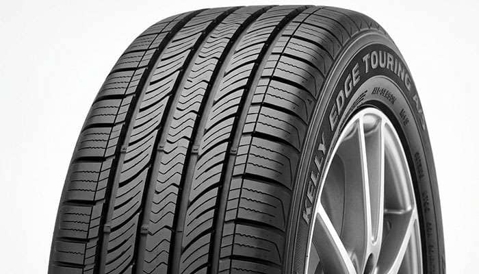 Kelly Edge Touring all-season tire tread pattern close-up showing circumferential grooves