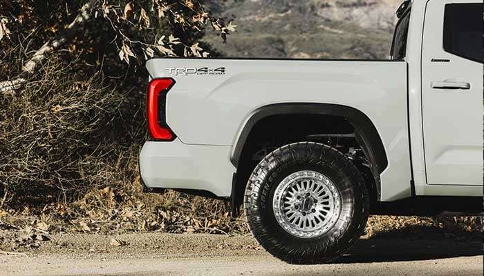 KMC Chase wheel with simulated beadlock ring and aggressive off-road design in satin black finish