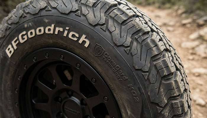 Close-up of BFGoodrich KO2 CoreGard sidewall showing raised lettering and shoulder tread blocks