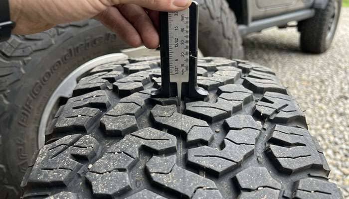 Tread depth gauge measuring the tread on a BFGoodrich KO2 all-terrain tire