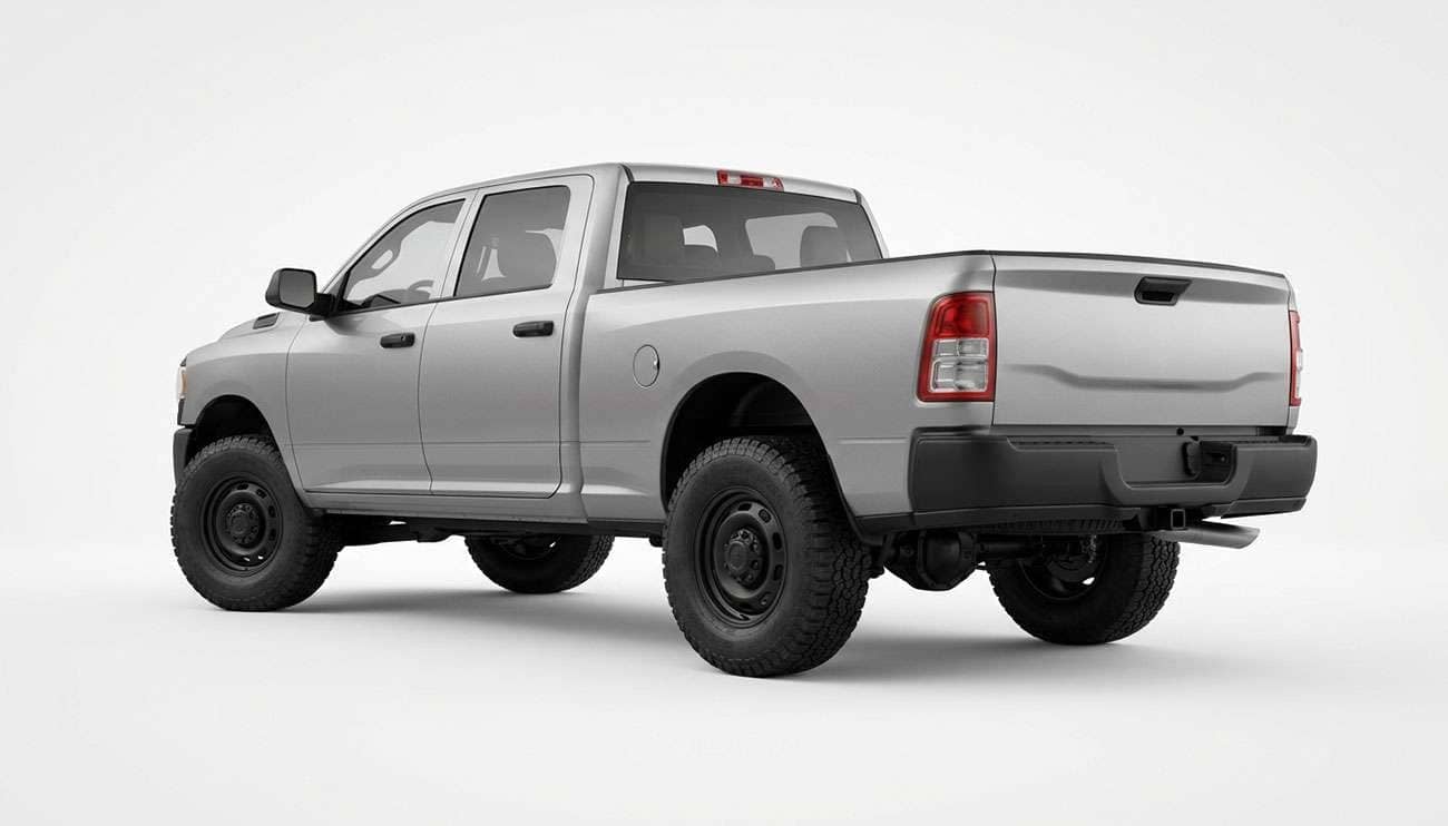 Heavy duty three-quarter ton pickup truck fitted with Load Range E light truck tires, rear three-quarter view