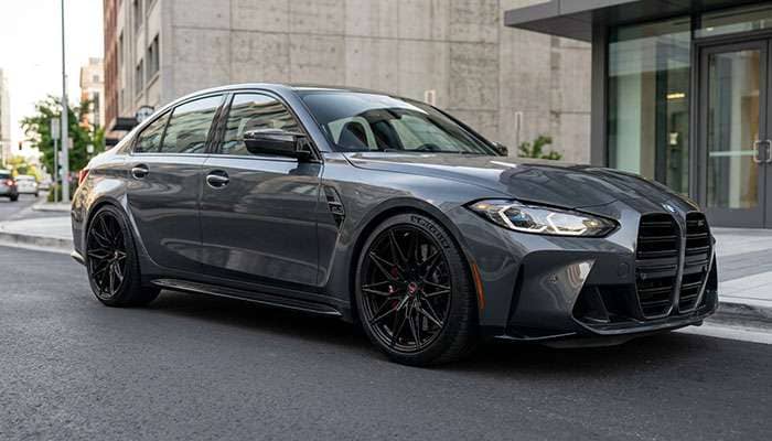Low profile tires installed on large diameter custom wheels on a performance vehicle showing correct plus-sizing fitment