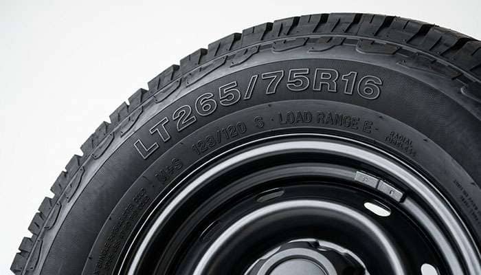 Close-up of LT265/75R16 sidewall showing the load index and Load Range E markings