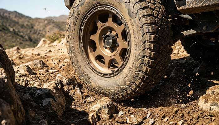 Close-up of Method car wheels tested in extreme off-road conditions showing durability and performance