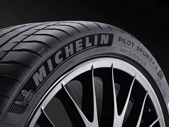 Close-up of a Michelin Pilot Sport 4S tire showcasing its tread design by Michelin North America, Inc.