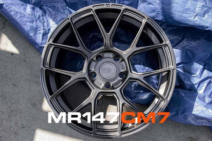 Motegi Racing wheel displaying sleek multi-spoke design and high-performance construction