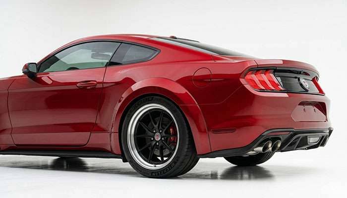 Ford Mustang rear quarter showing a 20x10 wheel filling the rear fender
