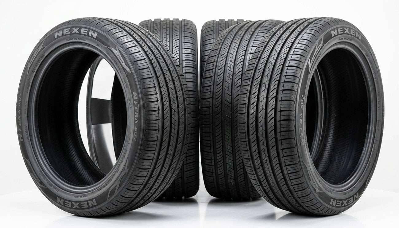 Set of Nexen tires displayed on a clean white studio backdrop