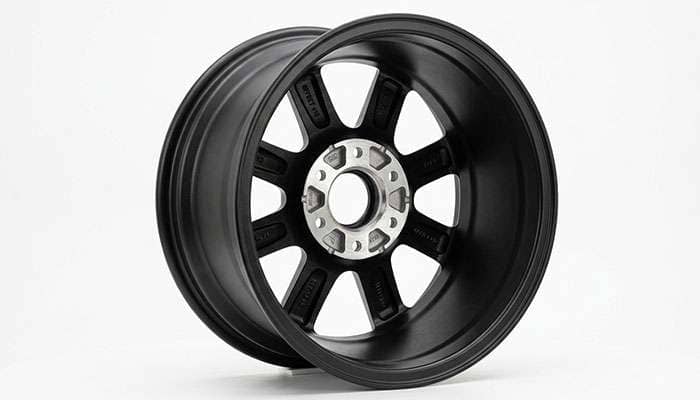 Off-road wheel viewed from the back showing backspacing and mounting pad