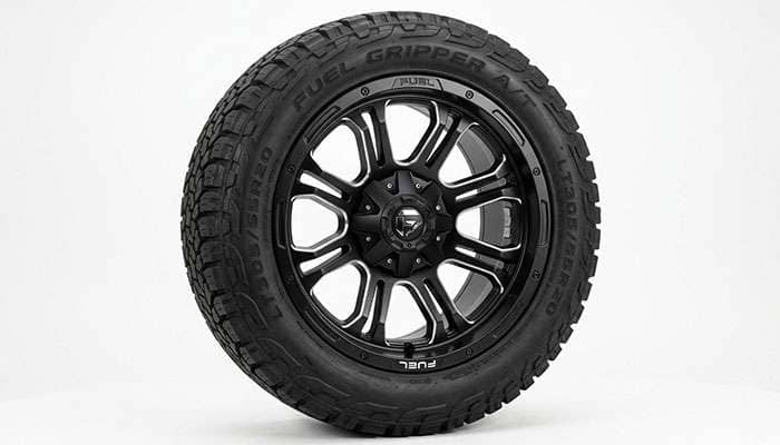 Fuel Assault D546 off-road wheel mounted with an all-terrain tire as a package