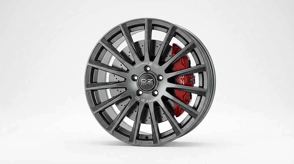 OZ Racing Superturismo AERO-e alloy wheel with a carbon fiber texture and multi-spoke design