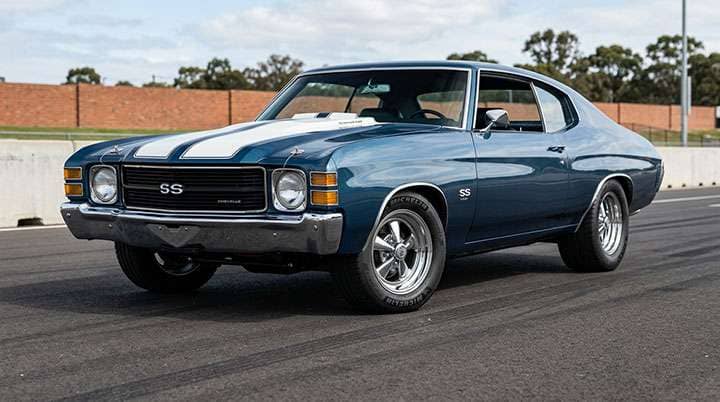 High-performance radial tires mounted on classic muscle car showing modern grip and handling capabilities for vintage vehicle