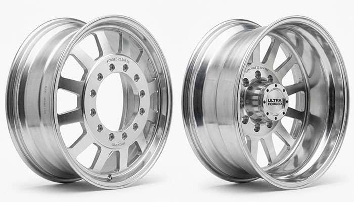 Two truck wheels compared showing positive offset tucked in versus negative offset pushed outboard