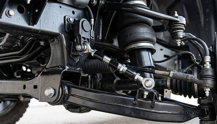 Adjustable air suspension height sensor link installed on a Ram 1500 front suspension