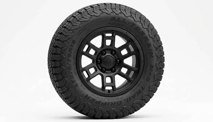 LT275/70R18 all-terrain light truck tire mounted on an 18-inch black Ram 1500 Rebel wheel
