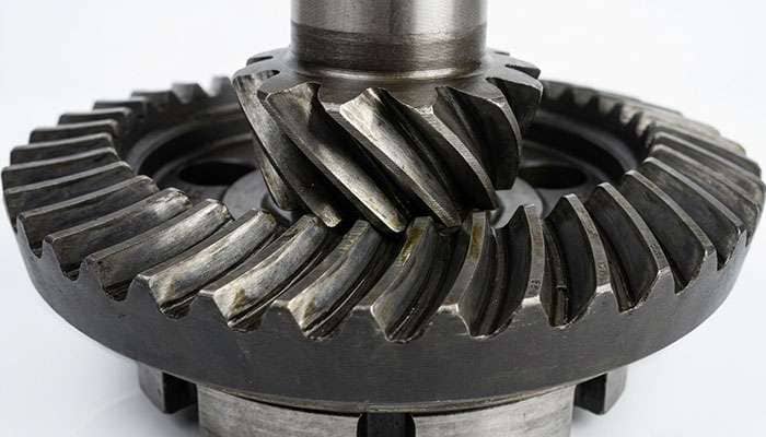 Close-up of ring and pinion gear teeth showing the meshing contact pattern
