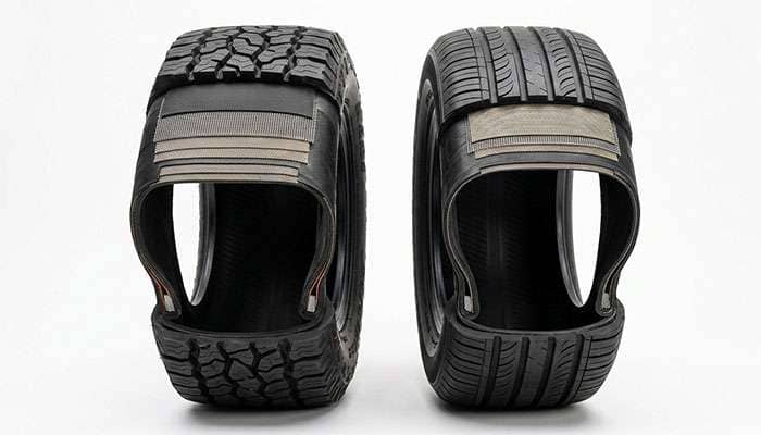 Cutaway view of a run-flat tire showing the thick reinforced sidewall structure compared with a conventional tire sidewall