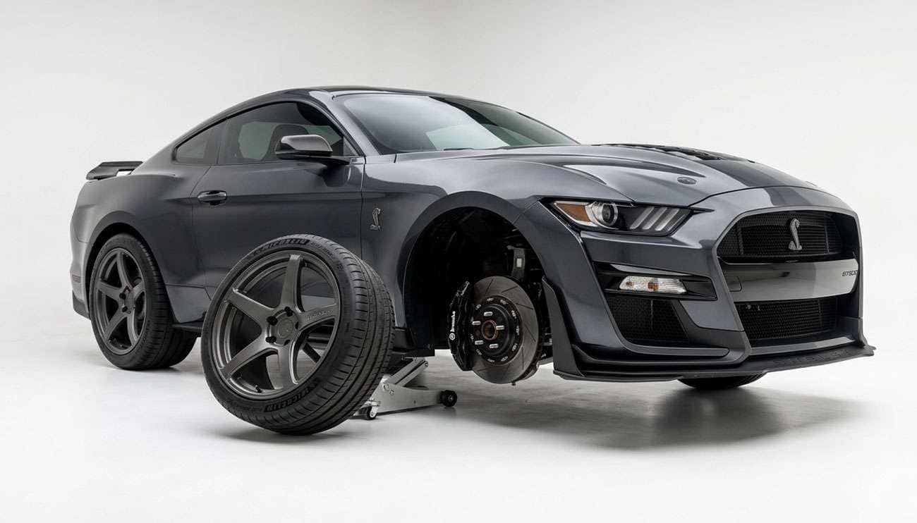 S550 Mustang wheel being test-fit on an S650 Mustang with Brembo brakes