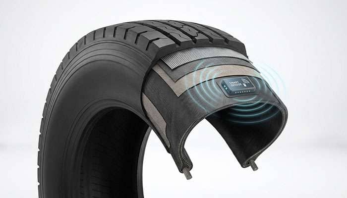 Cutaway of a Conti Hybrid RSS tire showing an internal sensor transmitting data wirelessly for off-highway OEM applications