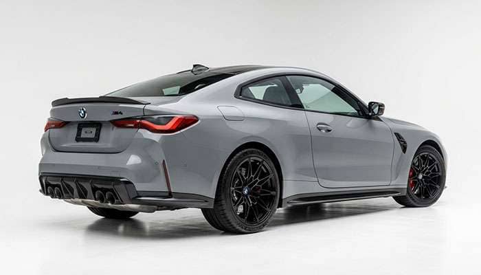 Modern performance coupe with staggered wheel and tire fitment