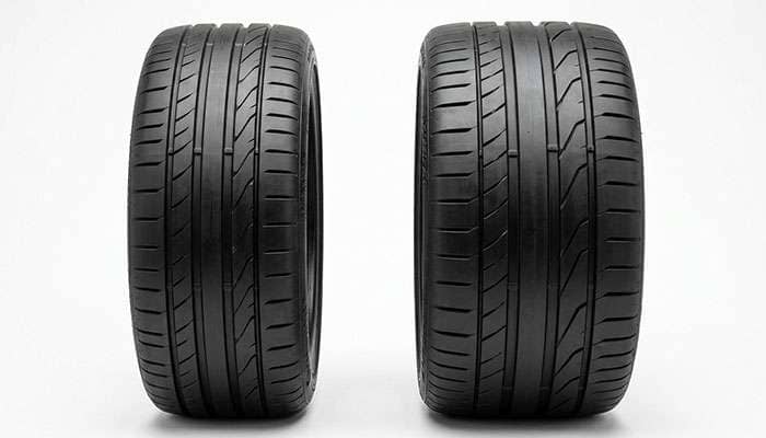 Narrow front and wide rear performance tires from a staggered Porsche setup side by side