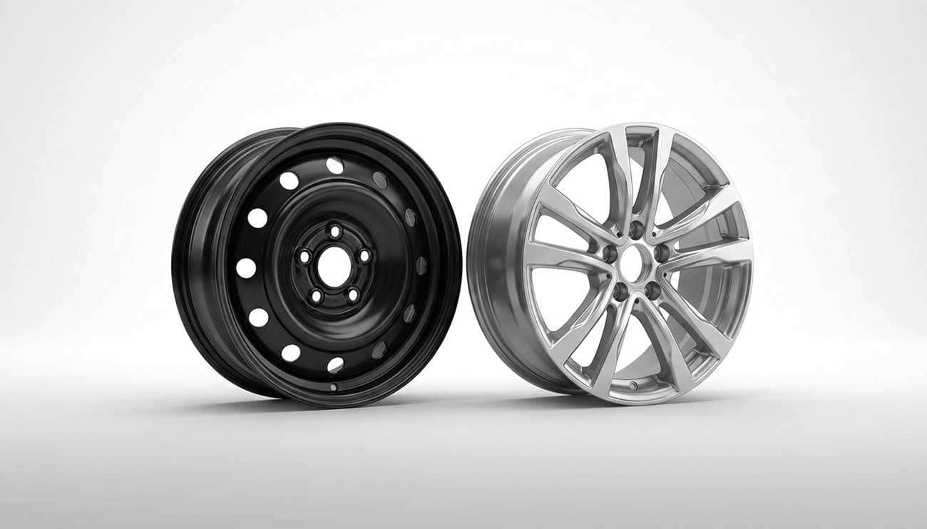 Steel wheel and alloy wheel side by side comparison showing weight and design differences