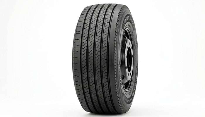 Close-up of a commercial steer tire with straight ribbed tread
