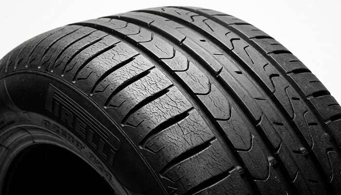 Pirelli P Zero PZ4 summer tire showing compound surface cracking from cold weather exposure