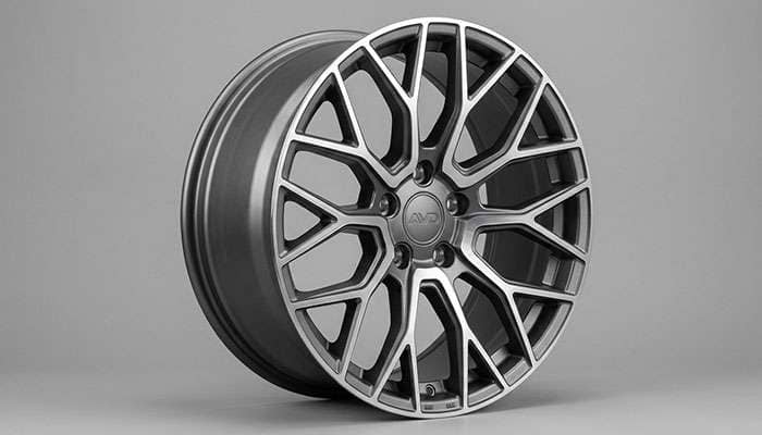 Close-up of a modern SUV wheel showing crossover-style design with 5-lug bolt pattern