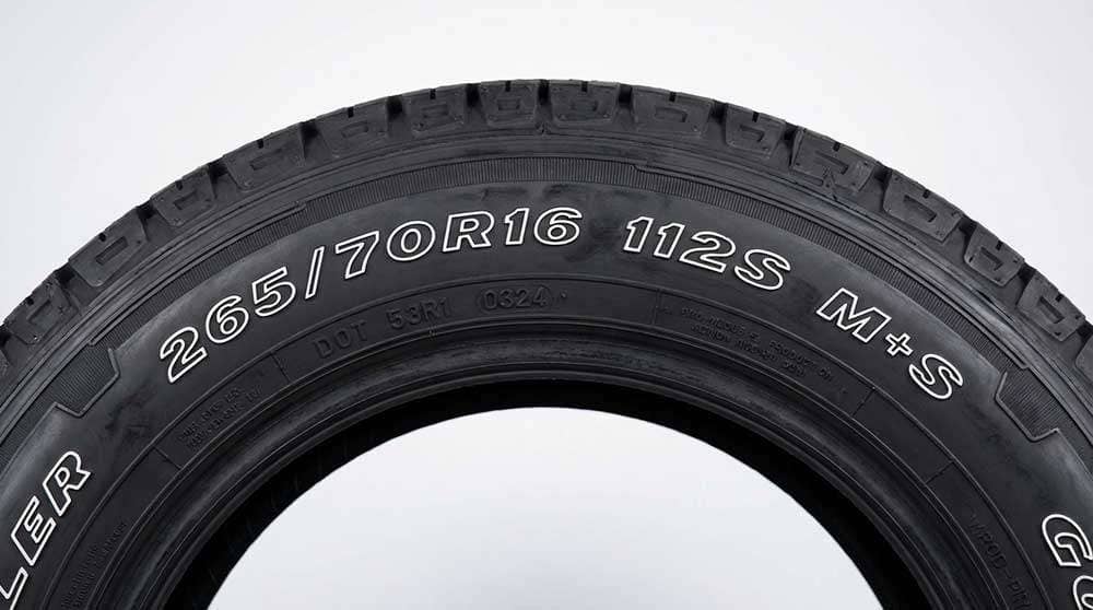 Diagram explaining how to read tire sidewall markings, including size, load index, and speed rating