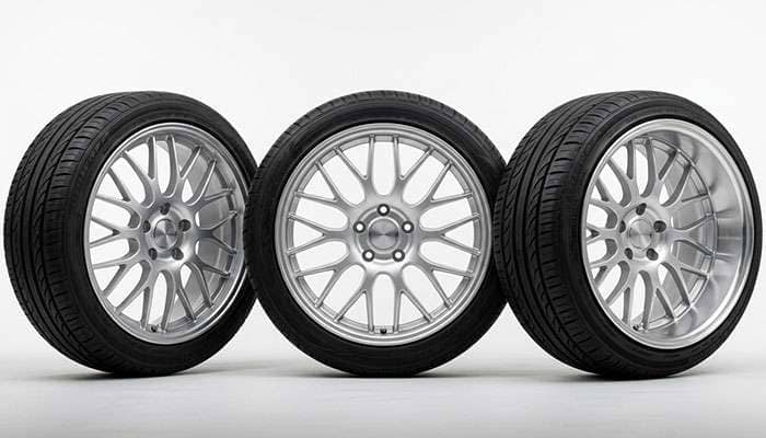 Three identical low profile tires mounted on narrow, correctly sized, and over-wide wheels showing how sidewall angle changes with rim width