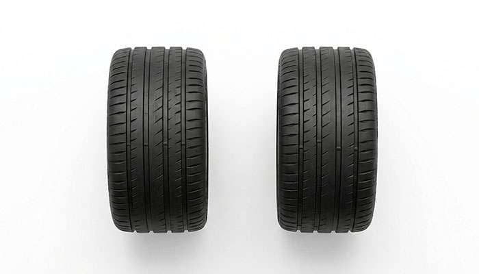 Top-down view of front wheels angled to show tire toe alignment