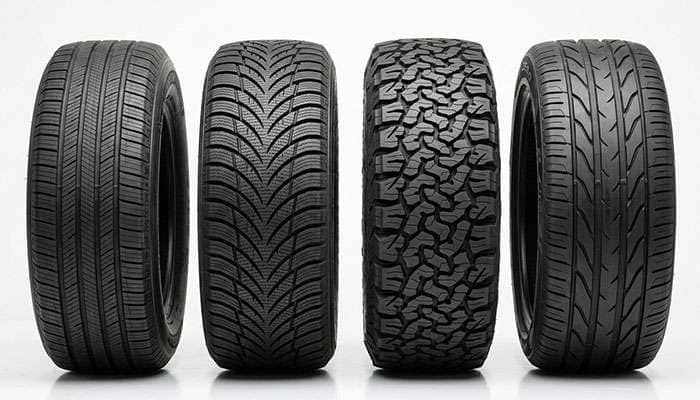 four different tire types side by side showing all-season winter all-terrain and high performance tread patterns for comparison