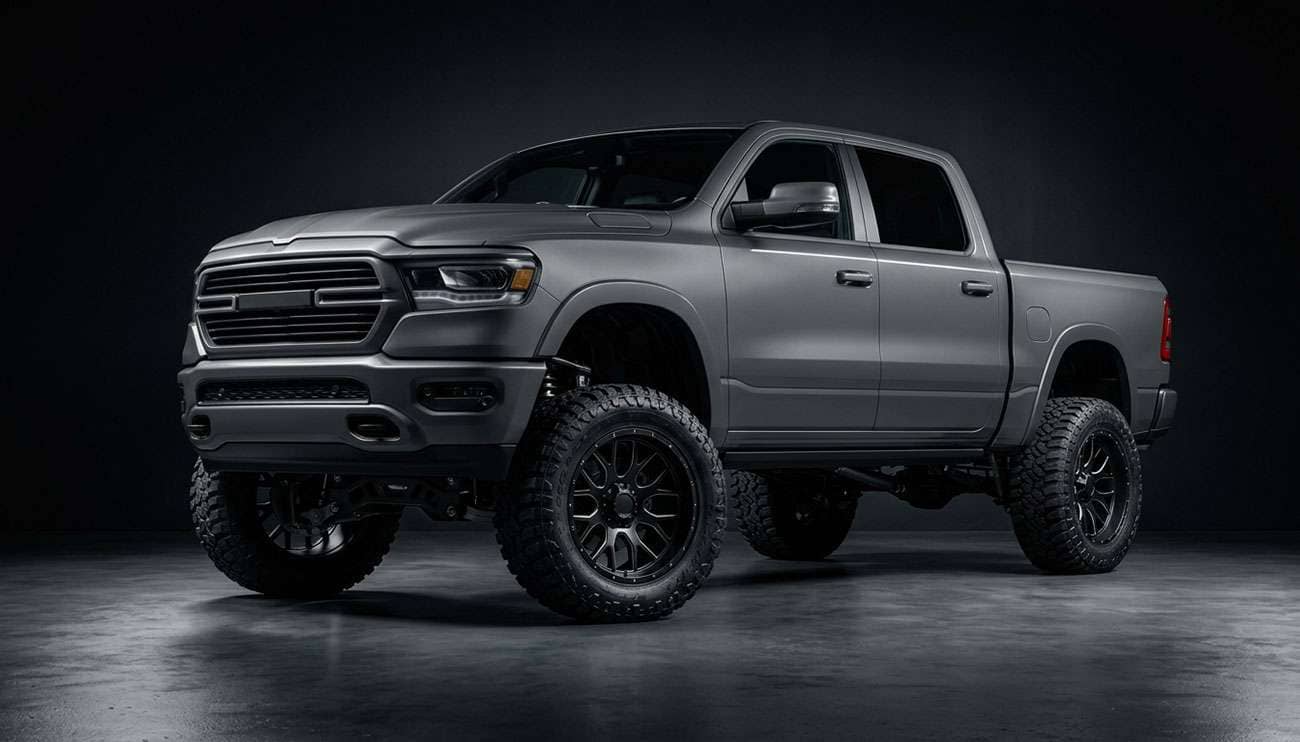 Lifted pickup truck with aggressive aftermarket wheels in dramatic shop setting