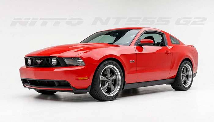 2012 Ford Mustang GT on American Racing AR105M Torq Thrust M 18x9 anthracite wheels with Nitto NT555 G2 255/45ZR18 tires