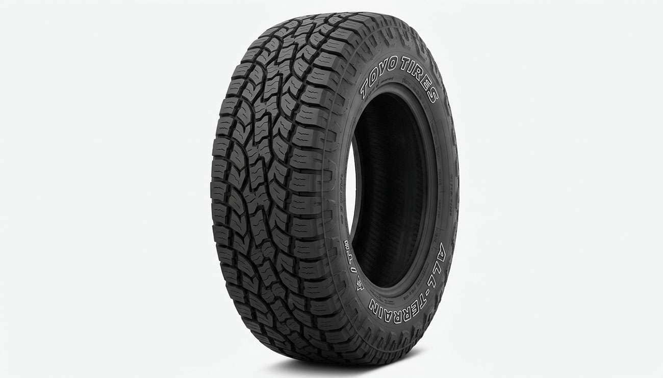 Toyo Open Country A/T III all-terrain tire on a clean studio backdrop