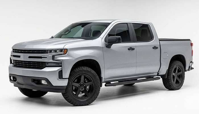 Second generation Toyota Tundra pickup fitted with aftermarket five spoke 5x150 wheels and all-terrain tires