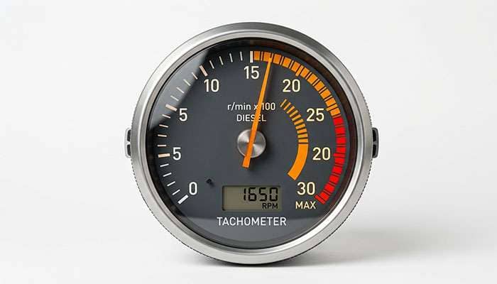 Truck tachometer RPM gauge showing engine RPM at highway cruise speed