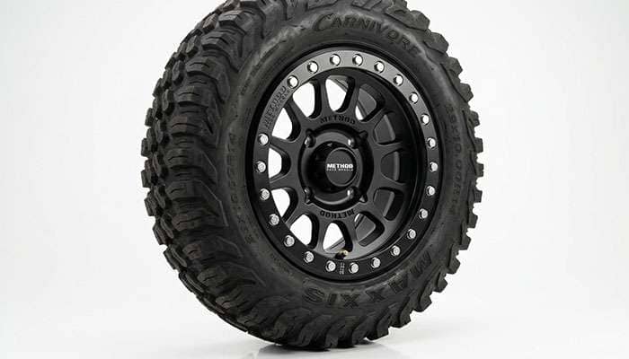 Close-up of a UTV beadlock wheel showing the outer clamping ring and bolts