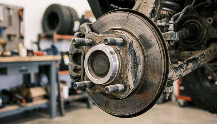 Bare UTV hub with four studs and the raised centering flange visible