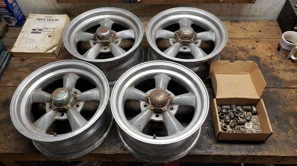 Set of four vintage 15x7 Torq-Thrust style alloy wheels with lug nuts and washers