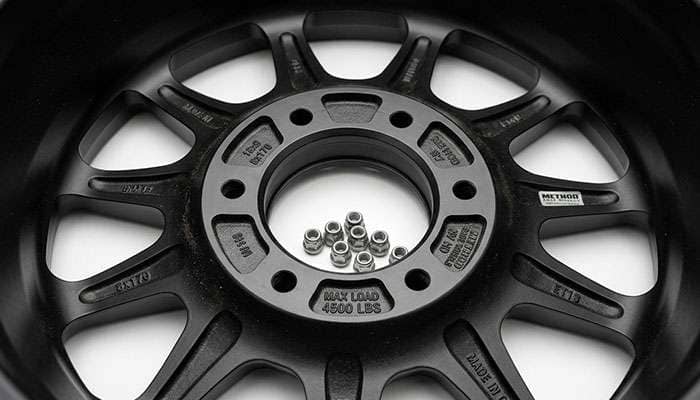 Back pad of a Method 305 NV HD 18x9 matte black wheel showing the cast 4500 LBS load rating stamp