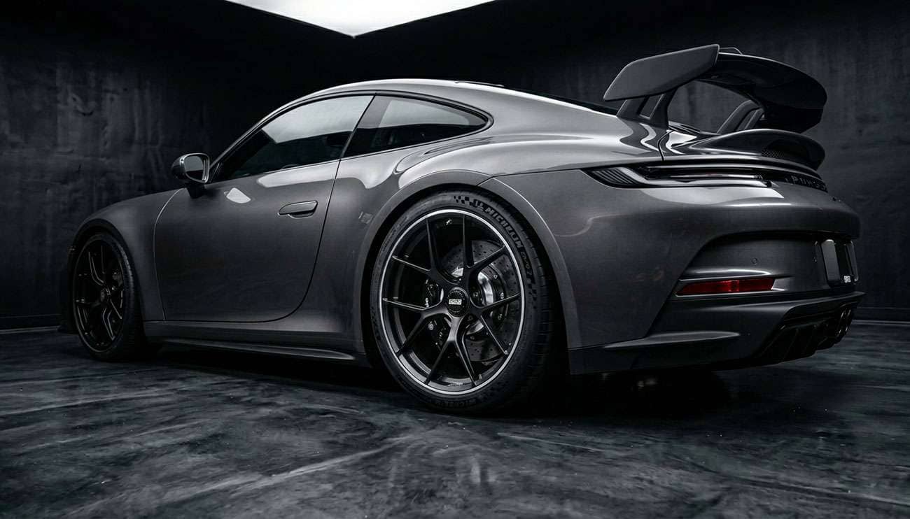 Wheel spacers installed on a performance car showing extended wheel offset and flush fitment