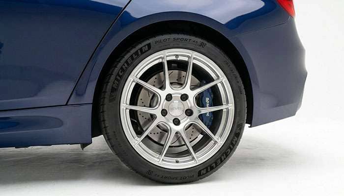 A freshly installed wheel and tire package mounted on a vehicle ready for its first drive