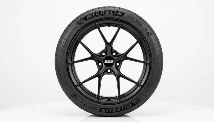 A tire mounted on a wheel showing how tire width should match the rim width for proper fitment