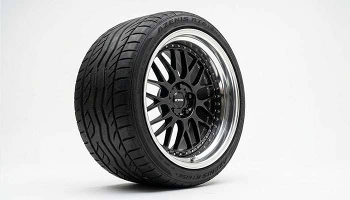 Wider aftermarket wheel showing how added width affects fender and suspension clearance