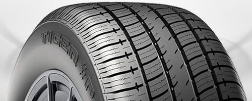 Touring tire showcasing smooth tread design for quiet comfortable highway driving